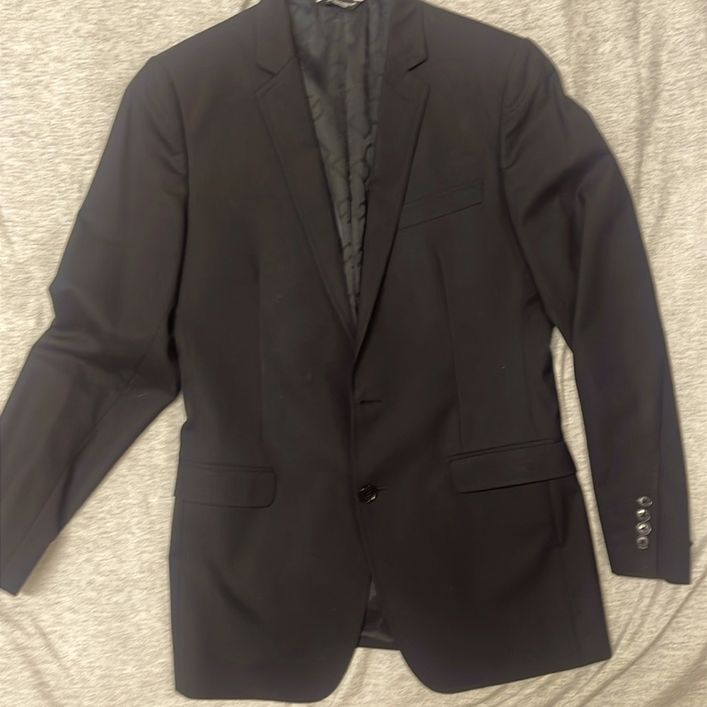 This is a very nice dolce and Gabbana, black men’s blazer and worn four or five